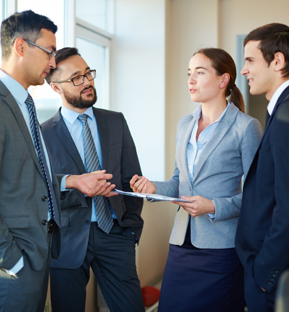 Two family law attorneys in Fort Pierce Florida having a conversation with their two clients.