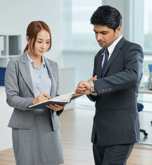 A female Stuart lawyer and a male Stuart lawyer.